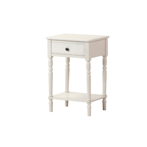 Esta mesita auxiliar de estilo clásico renovado es ideal para dormitorios o rincones con encanto. Fabricada en MDF y patas de pino, presenta un acabado blanco mate combinado con un tirador negro, aportando un contraste elegante y atemporal. Incluye un cajón funcional y una balda inferior para almacenamiento adicional. Perfecta como mesita de noche o mueble auxiliar en salones o entradas.